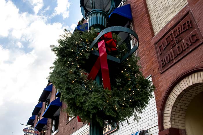 Holiday Wreath Hanging on Antique Street Lamp