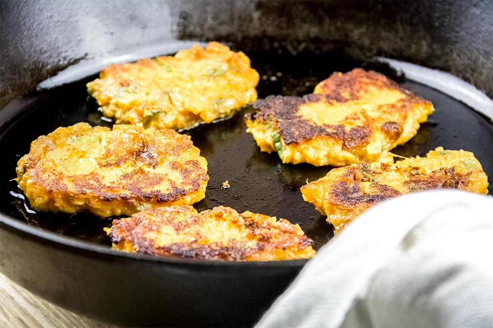 Cooking Sweet Potato Cakes in Large Cast Iron Skillet