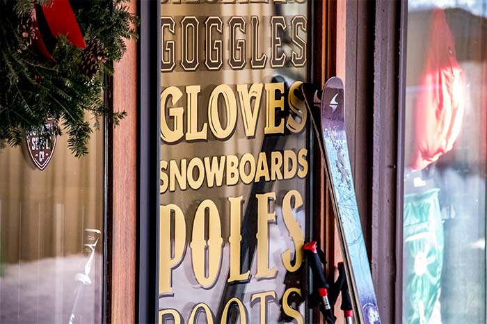 Goggles, Gloves, Snowboards Sign