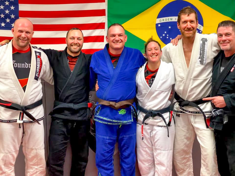 Mike Brown Belt Standing Group