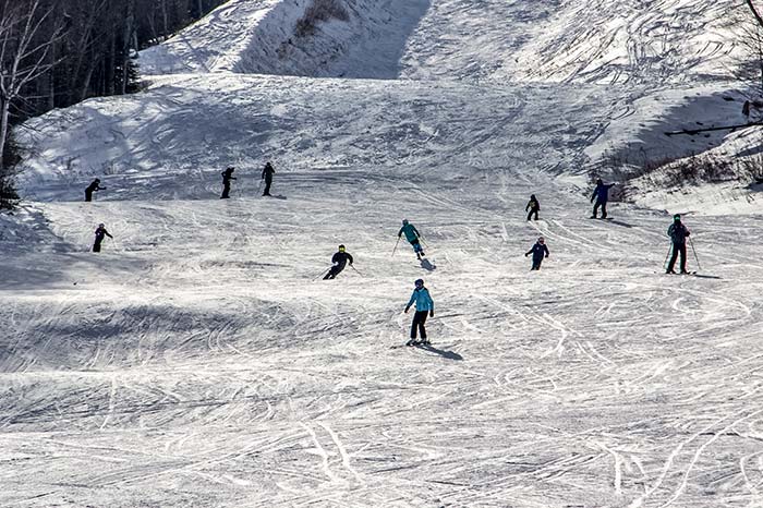 Skiers at Base of Mountain
