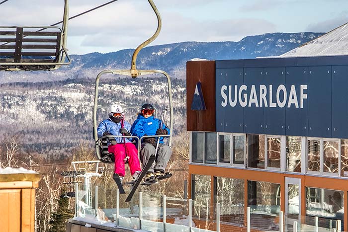 Skiers on Chairlift at Sugarloaf Mountain Resort