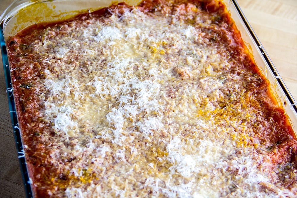 Adding Grated Parmesan to Baked Manicotti