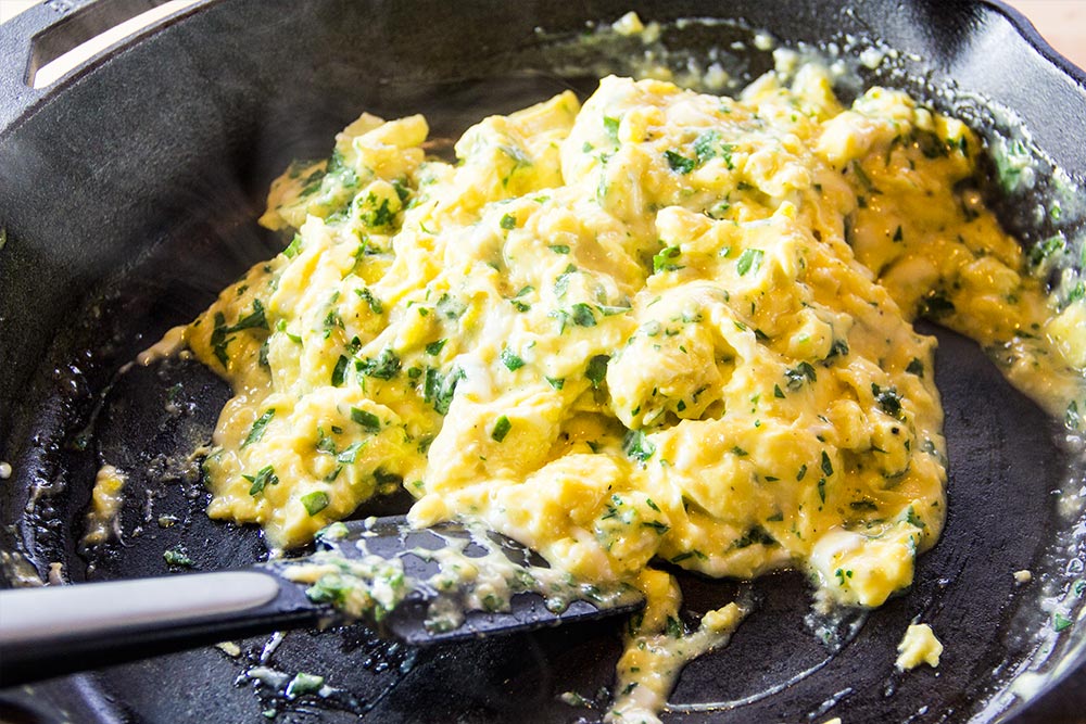 Cooked Scrambled Eggs in Skillet