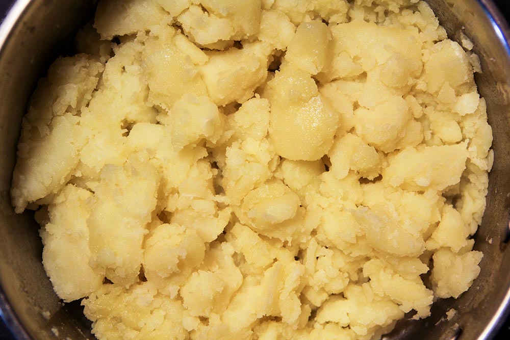 Crushed Potatoes in Saucepan
