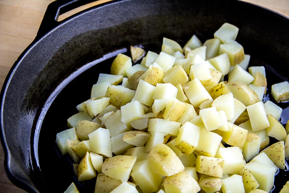 Diced Potatoes in Cast Iron Skillet