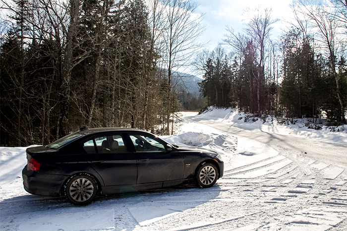 BMW 3-Series Parked in the Snow
