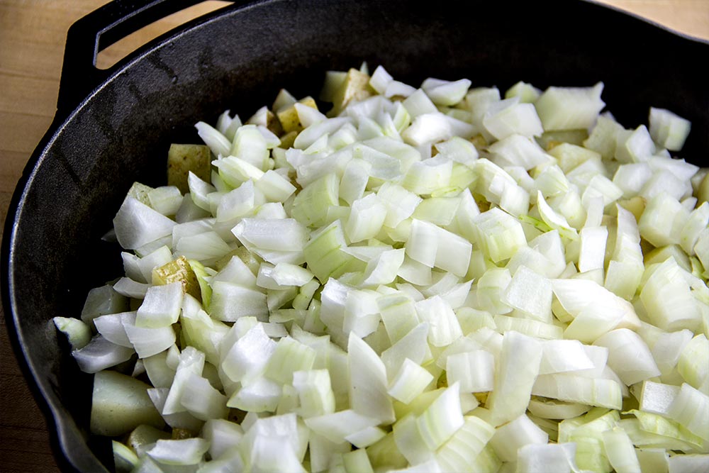 Potatoes, Onion & Garlic in Cast Iron Skillet