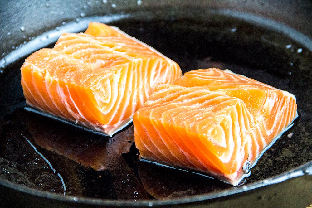 Raw Salmon in Cast Iron Skillet