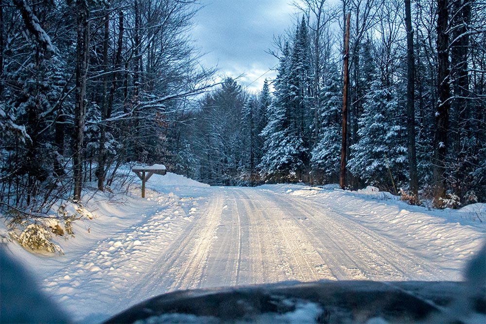 Driving On Snowy Country Road