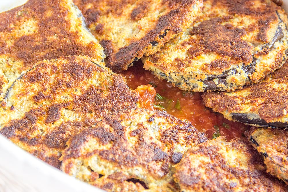 Stacking Baked Eggplant in Casserole