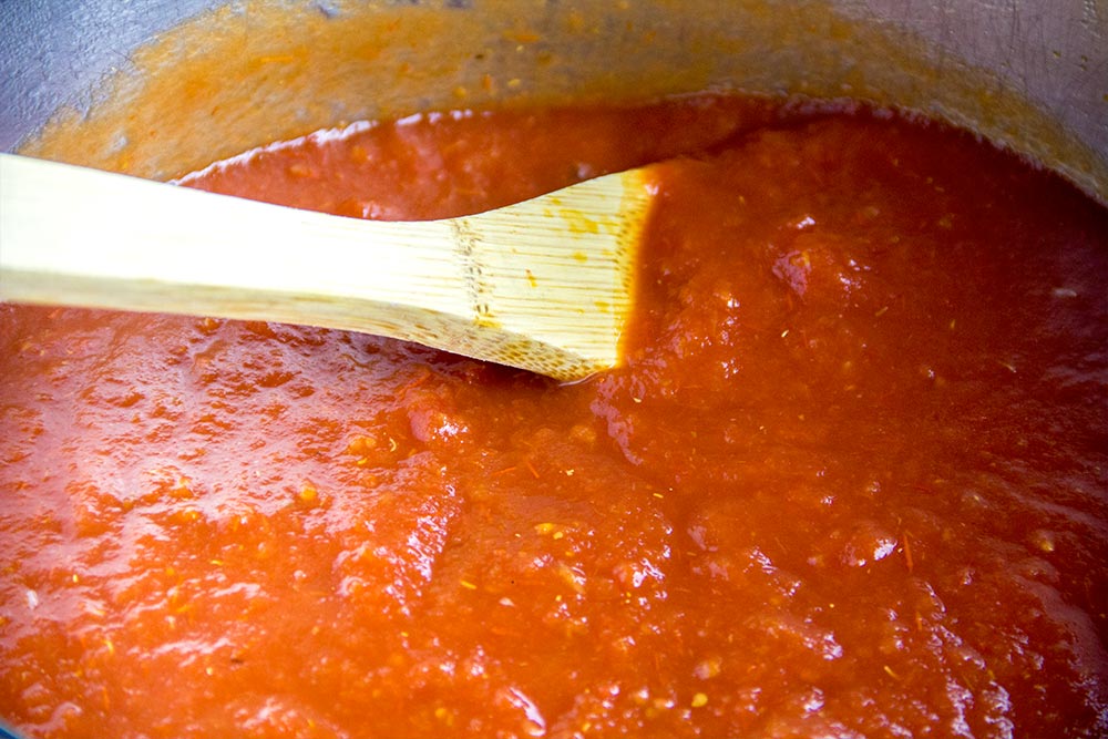 Stirring Homemade Tomato Sauce