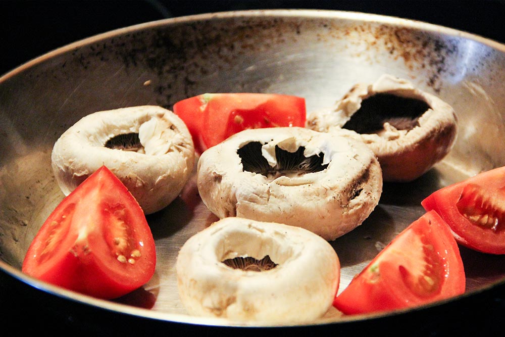 Tomatoes & Mushrooms Cooking in Skillet