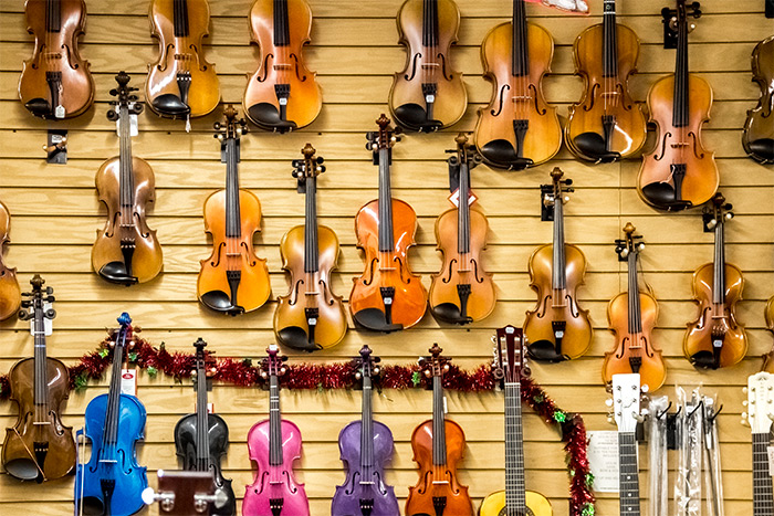 Violins Hanging on Wall