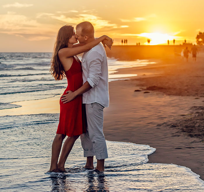 Couple in Love Kissing on Beach - Square Photo