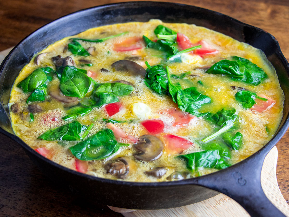 Uncooked Frittata in Cast Iron Skillet