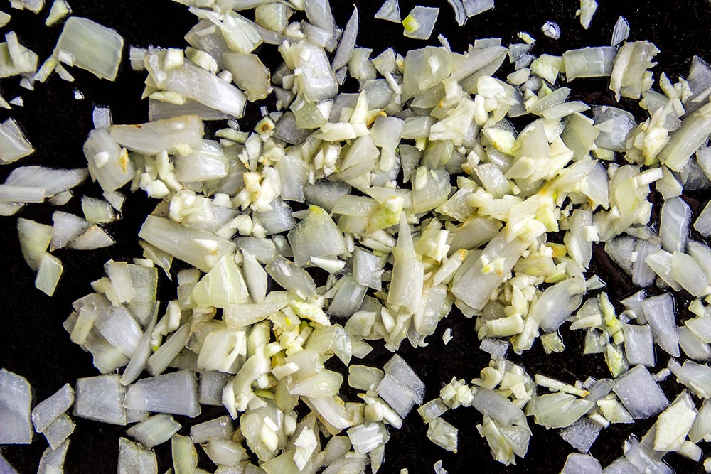 Cooking Chopped Onions & Minced Garlic in Skillet