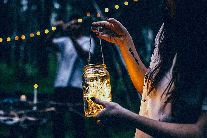 Dusk: Holding Jar with Lights in It