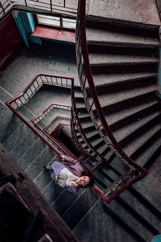 Woman Posing on Staircase