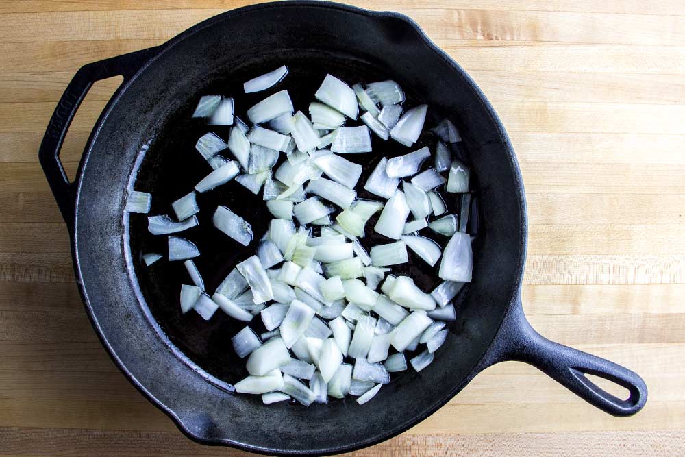 Chopped Onions in Cast Iron Skillet