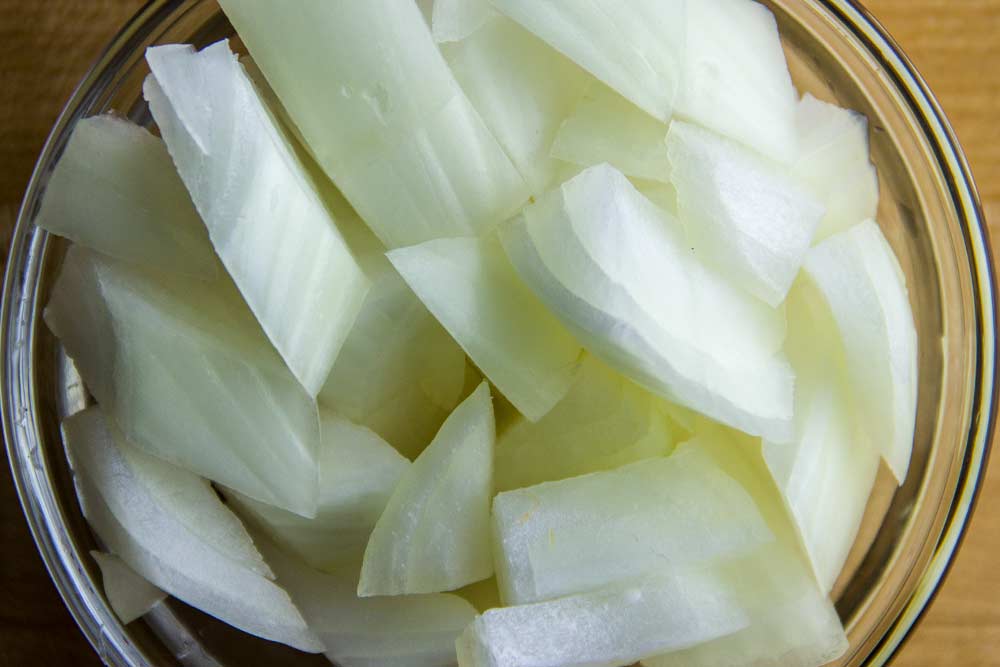 Coarsely Chopped Onions in Glass Bowl