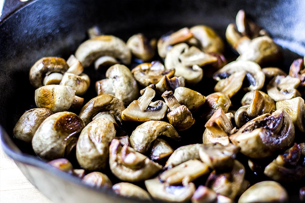 Cooked Mushrooms in Cast Iron Skillet